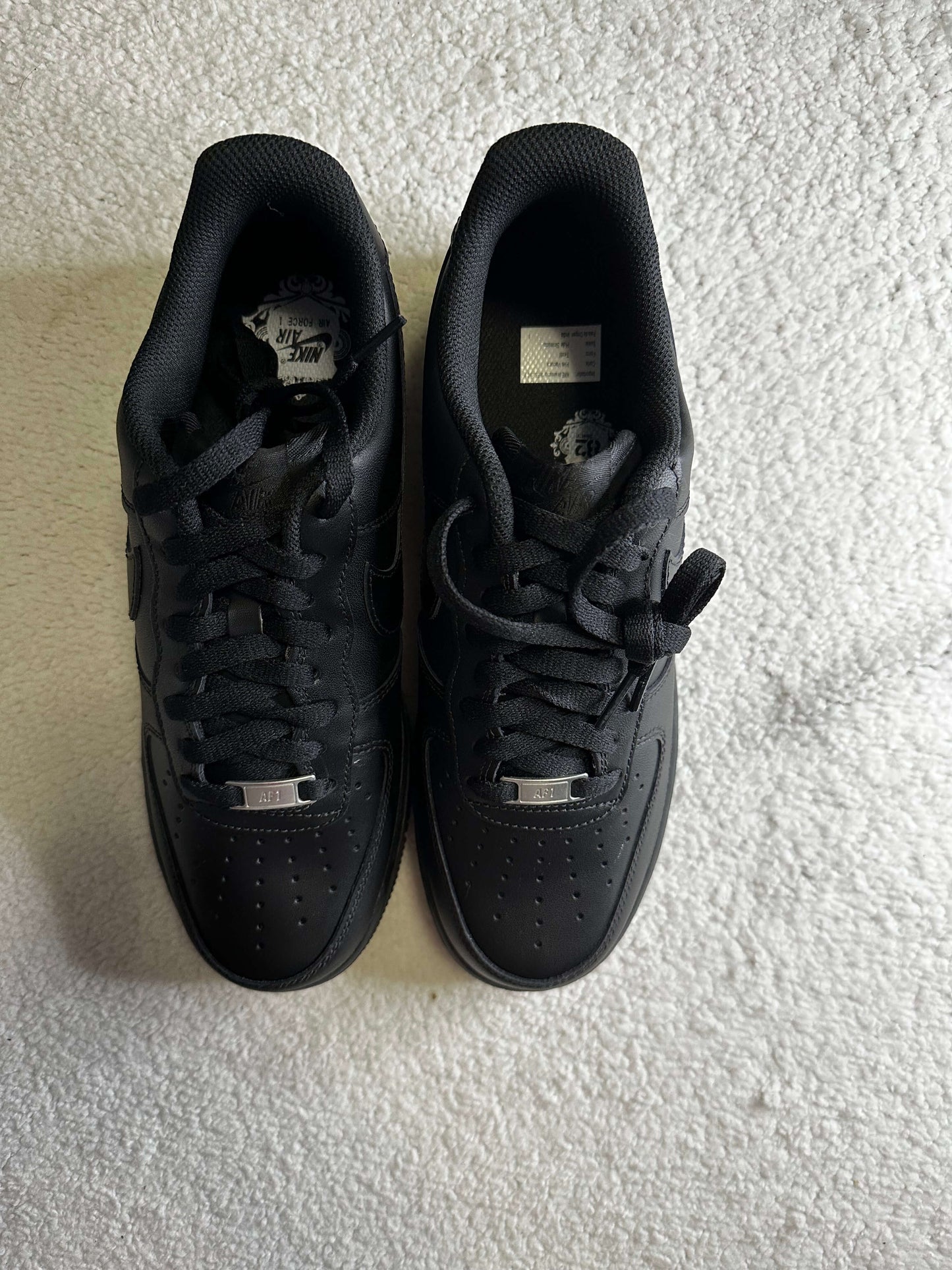 Sneakers Nike Air Force 1 '07 en color negro. Talla 27 cms